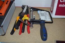 *Two Pairs of Pipe Grips and a G-Clamp