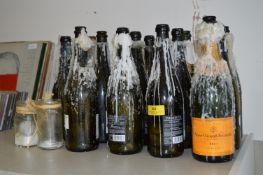 Assorted Prosecco & Champagne Bottles and Other Candle Holders