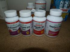 *4 Tubs containing Natural Aid Vitamin Supplements