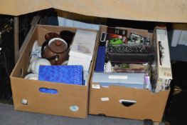 Two Boxes Containing a Large Quantity of Dinnerware, Decorative Plates, Glassware, Photo Albums,