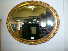 Gilt Oval Framed Bevelled Edge Wall Mirror