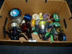 Box Containing Three Fixed Spool Beach Fishing Reels and Assorted Fishing Lines