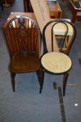 Two Odd Dining Chairs