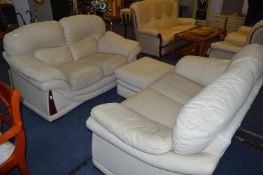 Pair of Cream Leather Two Seat Sofas and Poufe Stool