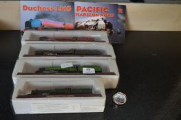 Four Diecast Model Train Engines and a Pocket Watch
