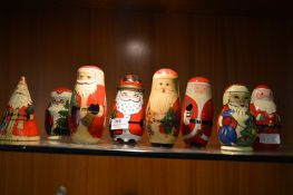 Collection of Eight Russian Doll Santas
