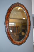 Oval Framed Bevelled Edge Wall Mirror