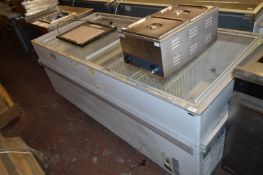 Display Freezer Enclosed by Sliding Glass Lid