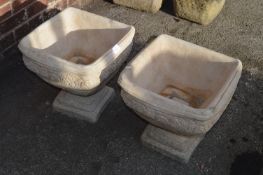 Pair of Garden Urns on Plinths