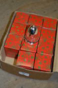 *Four Boxes Containing Twelve Chrome Christmas Tree Bells