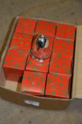 *Four Boxes Containing Twelve Chrome Christmas Tree Bells