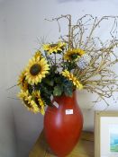 Large Red Pottery Vase and Artificial Flowers