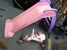 Little Tikes Child's Garden Slide and a Trike