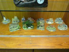 Twelve Danbury Mint Pottery Cottages