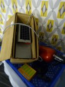 Slide Projector, Stainless Steel Cutlery and a Sod