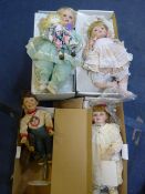 Four Heritage Porcelain Dolls