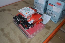 *Five Boxes of Red Pens, Five Notebooks and Box of