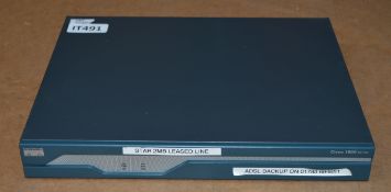 1 x Cisco 1841 Router - Model CISCO1841 V06 - CL011 - Ref IT491 - Location: Altrincham WA14