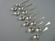 A SET OF TWELVE DELICATE SILVER COFFEE SPOONS with slim tapered handles having bright cut floral