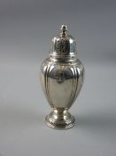 A HALLMARKED SILVER SUGAR SIFTER, 15 cms high, Sheffield 1963, 5 troy ozs, maker C J Vander Ltd