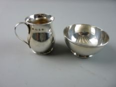 A MINIATURE SILVER CREAM JUG AND SUGAR BASIN each of plain form, the bowl on a slightly raised