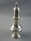 A HALLMARKED SILVER SUGAR SIFTER, 19 cms high, Birmingham 1911, 3.6 troy ozs
