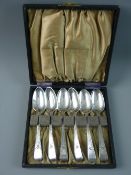 A SET OF SIX GEORGIAN SILVER TEASPOONS with bright cut decoration and 'E W' monogram, hallmarked