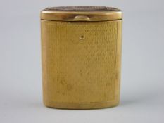 A NINE CARAT GOLD ENGINE TURNED MATCH HOLDER of oval form with pull-out body, 31 grms