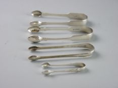 FOUR PAIRS OF SILVER SUGAR NIPS, mixed ages, 4 troy ozs