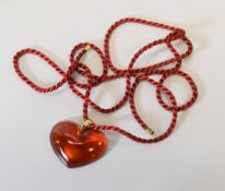 A LALIQUE GLASS HEART PENDANT
