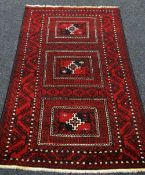 DEEP RED GROUND IRANIAN RUG 195 x 120cms