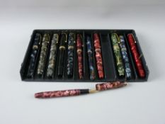 TWELVE CONWAY STEWART FOUNTAIN PENS with fourteen carat gold nibs including a 55, two 28s, two