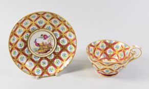 A NANTGARW PORCELAIN CUP & SAUCER, circa 1818-20, the bell shaped cup with kidney shaped scroll