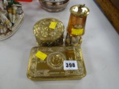 A 1914 brass military issued tobacco tin, a circular brass box etc