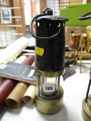 An early antique miners lamp imprinted no. 588