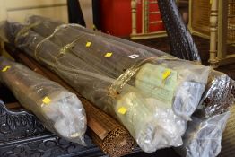 A parcel of fancy wood window shades (roller blinds)