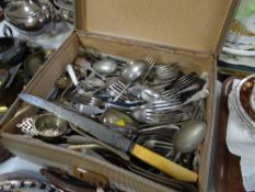 A vintage suitcase and quantity of flatware etc