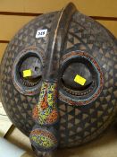 A large native mask with bead work