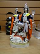 Two Staffordshire flat back figures - male with deer, female with dog