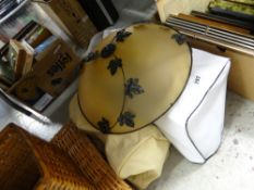 Two sewing machines and a hanging floral shade