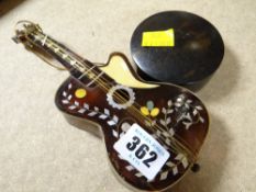 A tortoiseshell miniature guitar ornament and a box