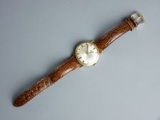 A JULES JURGENSEN FOURTEEN CARAT GOLD CASED GENT'S AUTOMATIC WRISTWATCH, the dial set with baton