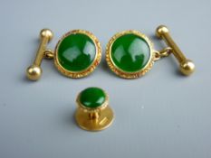 A PAIR OF TEN CARAT GOLD & DARK JADE CUFFLINKS with matching stud
