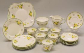 A TWENTY-ONE PIECE SHELLEY PRIMROSE TEA SET