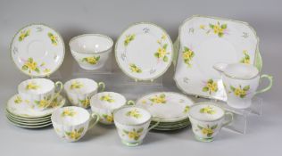 A TWENTY-ONE PIECE SHELLEY 'PRIMROSE' TEA-SET