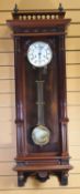 A LARGE GERMAN REPRODUCTION VIENNA WALL-CLOCK with enamel dial bearing Roman numerals within a