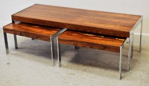 A DANISH ROSEWOOD NEST OF THREE TABLES comprising Long John coffee table and two smaller on