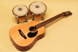 A CASED MODERN INDONESIAN ACOUSTIC GUITAR & SET OF DRUM-BEAT BONGOS