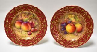 A PAIR OF ROYAL WORCESTER FRUIT PLATES BY RICHARD SEBRIGHT having gilt decoration to the Venetian-