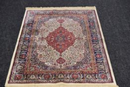 A SMALL IVORY GROUND KASHMIR RUG 170 x 117cms